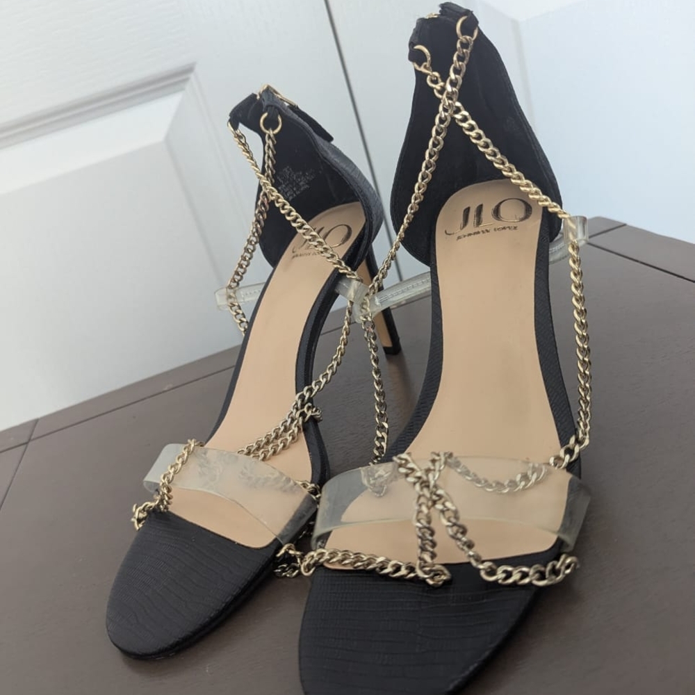 Jennifer Lopez Black Heels with Gold Chain Accents